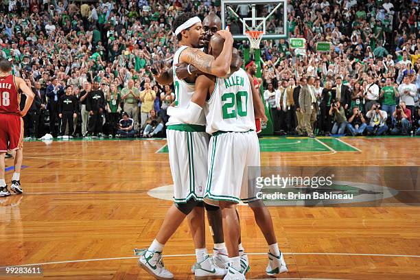 Rasheed Wallace, Ray Allen and Kevin Garnett of the Boston Celtics celebrate after a win in game six against the Cleveland Cavaliers in Game Six of...