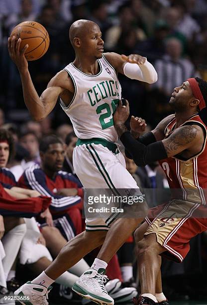 Ray Allen of the Boston Celtics tries to pass the ball as Mo Williams of the Cleveland Cavaliers defends during Game Six of the Eastern Conference...
