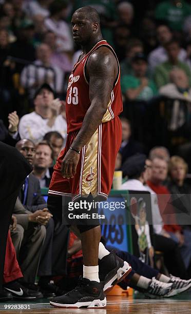 Shaquille O'Neal of the Cleveland Cavaliers walks to the bench after he is taken out of the game against the Boston Celtics during Game Six of the...