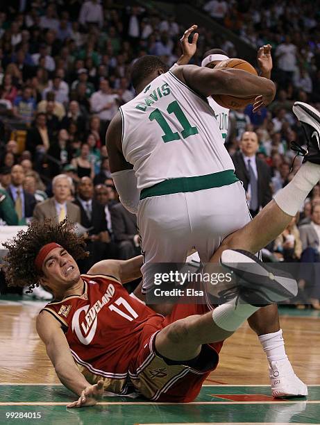 Glen Davis of the Boston Celtics is called for a loose ball foul on this play as Anderson Varejao of the Cleveland Cavaliers falls to the floor...