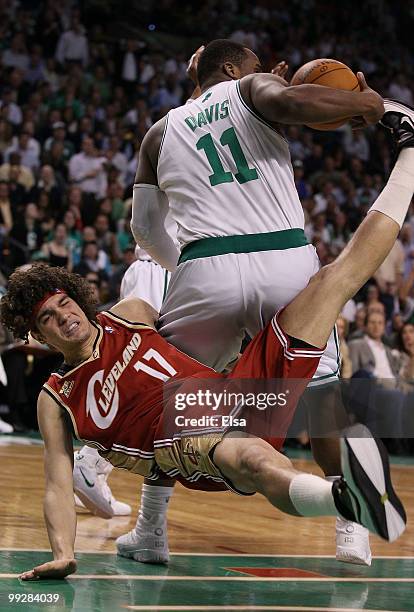 Glen Davis of the Boston Celtics is called for a loose ball foul on this play as Anderson Varejao of the Cleveland Cavaliers falls to the floor...