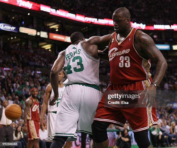 Kendrick Perkins of the Boston Celtics and Shaquille O'Neal of the Cleveland Cavaliers fight for the ball during Game Six of the Eastern Conference...