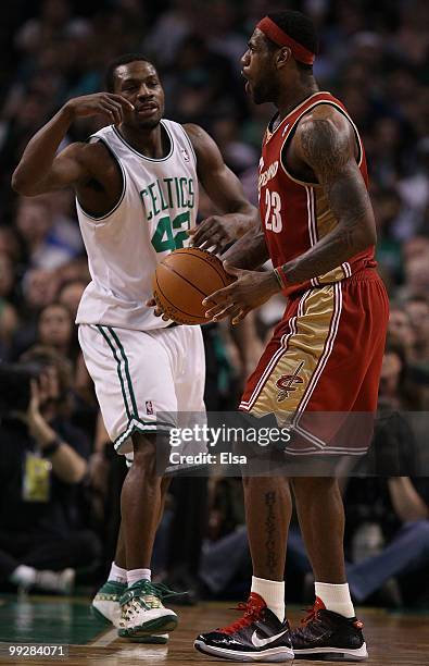 LeBron James of the Cleveland Cavaliers reacts to a foul call as Tony Allen of the Boston Celtics celebrates during Game Six of the Eastern...