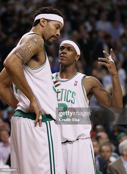 Rajon Rondo of the Boston Celtics talks with teammate Rasheed Wallace in the second half against the Cleveland Cavaliers during Game Six of the...