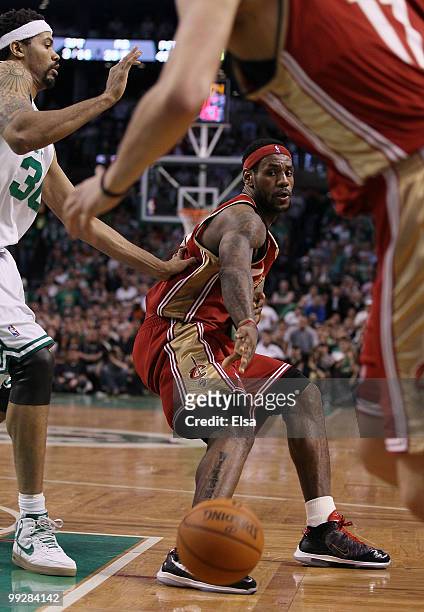 LeBron James of the Cleveland Cavaliers passes the ball to Anderson Varejao as Rasheed Wallace of the Boston Celtics defends during Game Six of the...