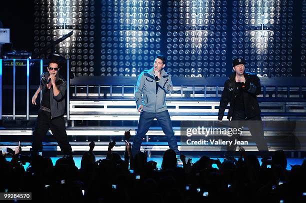 Joey McIntyre, Jonathan Knight and Donnie Wahlberg of New Kids on the Block perform at Fillmore Miami Beach on May 13, 2010 in Miami Beach, Florida.