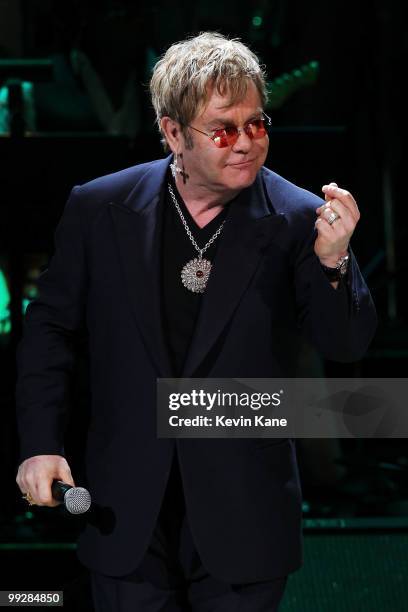 Elton John performs on stage during the Almay concert to celebrate the Rainforest Fund's 21st birthday at Carnegie Hall on May 13, 2010 in New York...