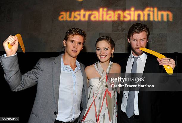 Actors Ryan Kwanten, Bella Heathcote and Chris Hemsworth, recipients of AIF Breakthrough Award pose during Australians In Film's 2010 Breakthrough...