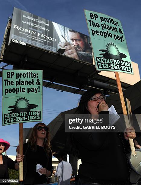 Protester shouts slogans against BP during a demonstration in front of the BP "Green Curve" Station, in Los Angeles, California, on May 12, 2010. BP...