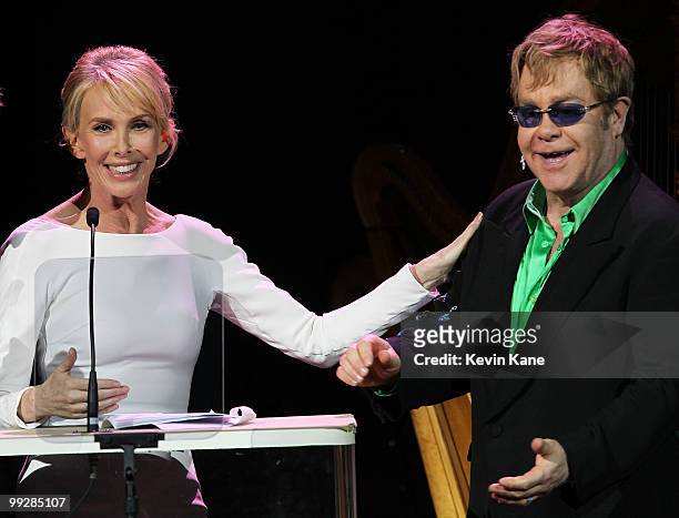 Trudie Styler and Elton John perform on stage during the Almay concert to celebrate the Rainforest Fund's 21st birthday at Carnegie Hall on May 13,...