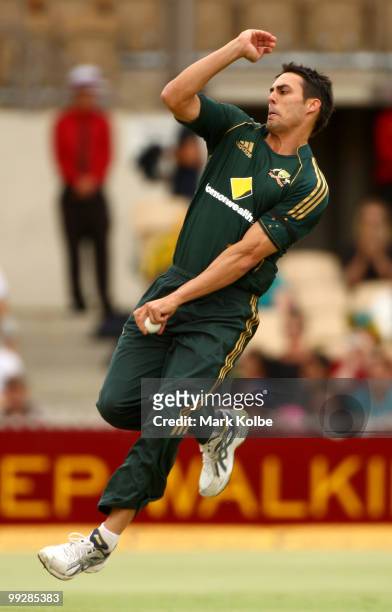 Mitchell Johnson of Australia bowls during the Commonwealth Bank Series One Day International game four match between Australia and New Zealand at...