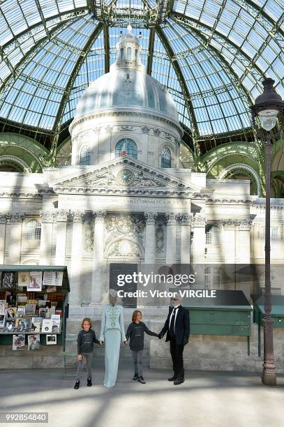 Adut Akech, Hudson Kronig and Karl Lagerfeld walk the runway during the Chanel Haute Couture Fall Winter 2018/2019 fashion show as part of Paris...