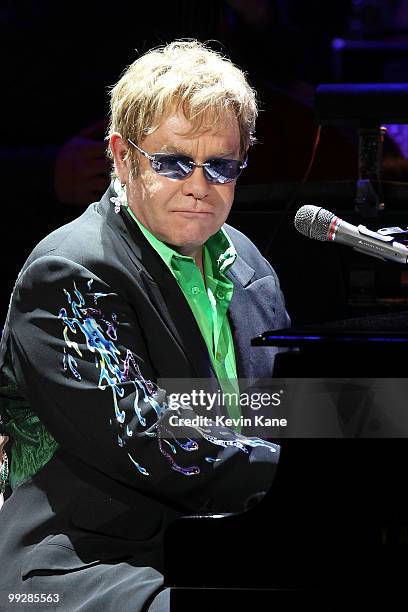 Elton John performs on stage during the Almay concert to celebrate the Rainforest Fund's 21st birthday at Carnegie Hall on May 13, 2010 in New York...