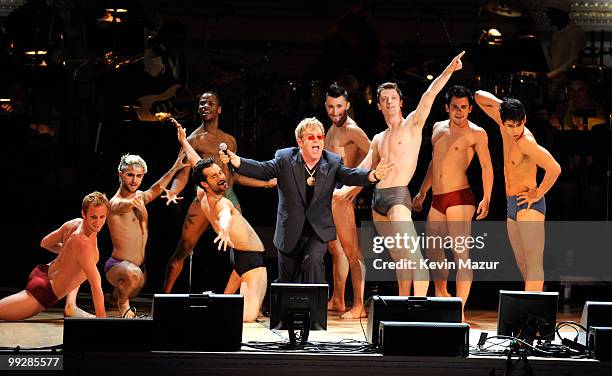 Elton John performs on stage during the Almay concert to celebrate the Rainforest Fund's 21st birthday at Carnegie Hall on May 13, 2010 in New York...