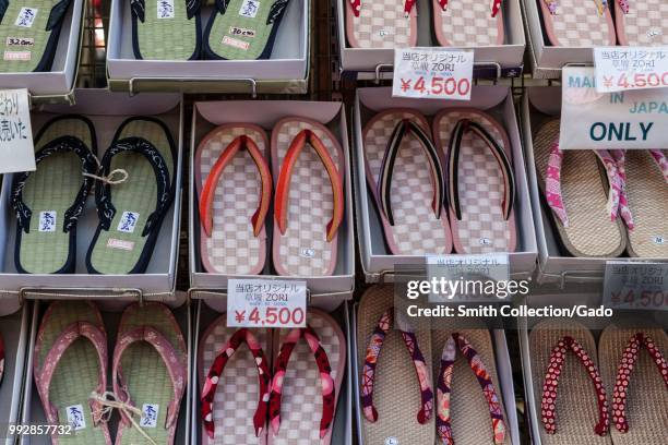 Traditional Japanese Zori sandals shelved in a shoe store in Nakamise shopping street, Asakusa, Tokyo, Japan, November 10, 2017.