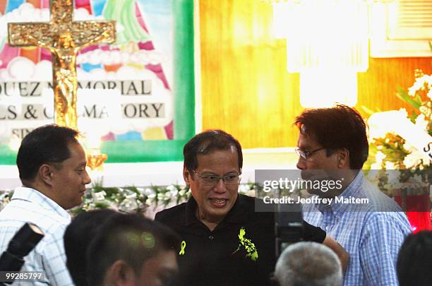 Benigno "Noynoy" Aquino is seen visiting a wake of his campaign staff killed on the day of election in Cavite as Aquino is unofficially announced as...