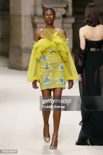 Model walks the runway during the Galia Lahav Haute Couture Fall Winter 2018/2019 show as part of Paris Fashion Week on July 4, 2018 in Paris, France.