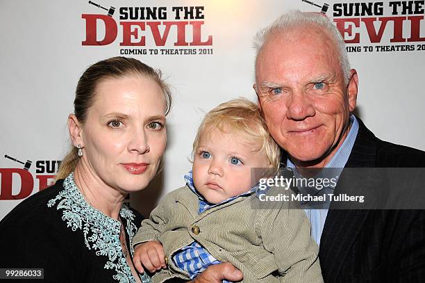 Actor Malcolm McDowell arrives with wife Kelley and son Seamus at the premiere of the film "Suing The Devil" at Fox Studios Hollywood on May 13, 2010...