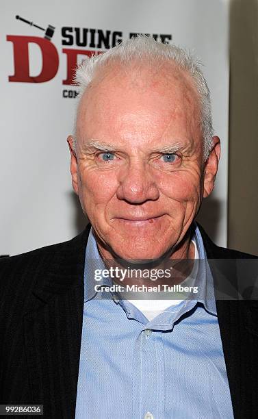 Actor Malcolm McDowell arrives at the premiere of the film "Suing The Devil" at Fox Studios Hollywood on May 13, 2010 in Los Angeles, California.