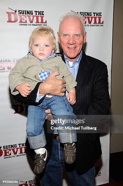 Actor Malcolm McDowell arrives with son Seamus at the premiere of the film "Suing The Devil" at Fox Studios Hollywood on May 13, 2010 in Los Angeles,...