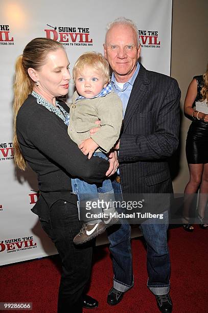 Actor Malcolm McDowell arrives with wife Kelley and son Seamus at the premiere of the film "Suing The Devil" at Fox Studios Hollywood on May 13, 2010...