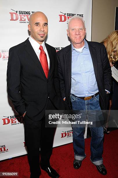 Peoducer Chris Roe and actor Malcolm McDowell arrive at the premiere of the film "Suing The Devil" at Fox Studios Hollywood on May 13, 2010 in Los...
