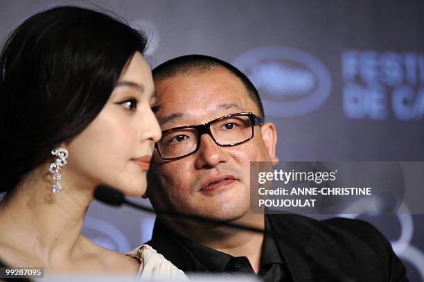 Chinese director Wang Xiaoshuai and Chinese actress Fan Bingbing attend the press conference of the film "Rizhao Chongqing" presented in competition...