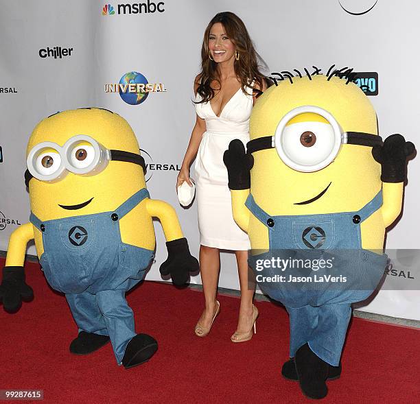 Actress Sarah Shahi and the Minions from "Despicable Me" attend "An Evening With NBC Universal" at The Cable Show 2010 at Universal Studios Hollywood...