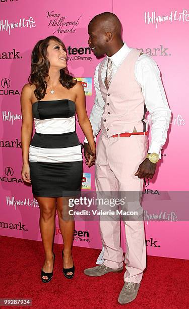 Personality Cheryl Burke and football player Chad Ochoci arrive at the 12th Annual Young Hollywood Awards on May 13, 2010 in Los Angeles, California.