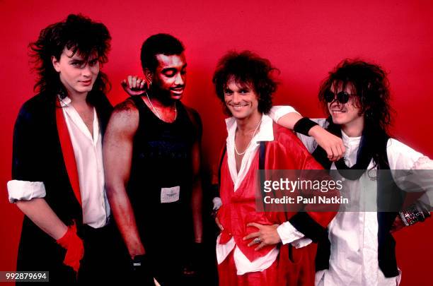 Portrait of the band Power Station, left to right, John Taylor, Tony Thompson, Michael Des Barres and Andy Taylor at the Poplar Creek Music Theater...