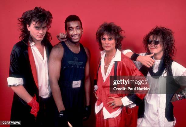 Portrait of the band Power Station, left to right, John Taylor, Tony Thompson, Michael Des Barres and Andy Taylor at the Poplar Creek Music Theater...