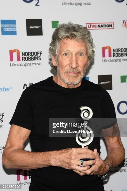 Roger Waters, winner of the O2 Silver Clef Award poses in the winner's room during the Nordoff Robbins' O2 Silver Clef Awards at Grosvenor House, on...