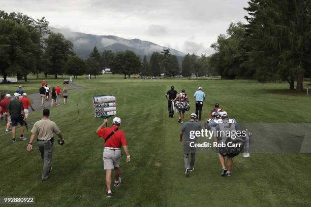 Phil Mickelson walks to his second ball on the 12th hole during round two of A Military Tribute At The Greenbrier held at the Old White TPC course on...