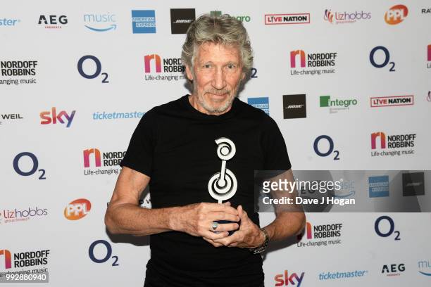 Roger Waters, winner of the O2 Silver Clef Award poses in the winner's room during the Nordoff Robbins' O2 Silver Clef Awards at Grosvenor House, on...