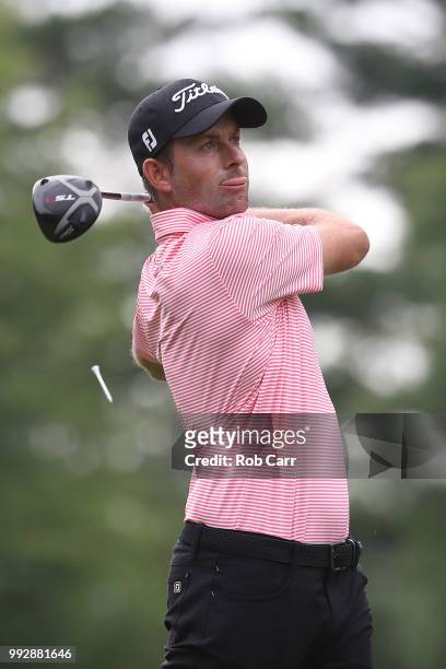 Webb Simpson tees off the 12th hole during round two of A Military Tribute At The Greenbrier held at the Old White TPC course on July 6, 2018 in...