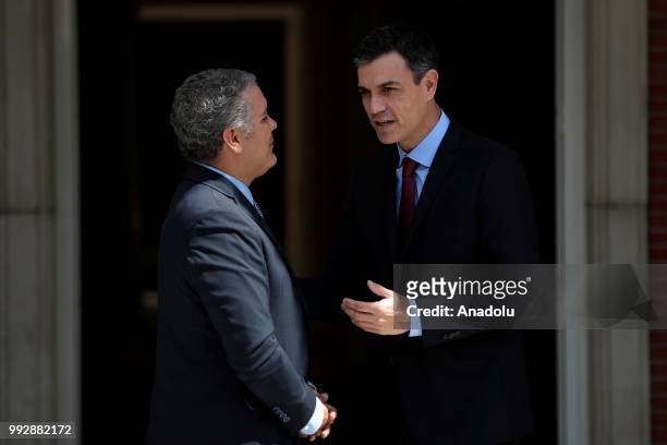 Spanish Prime Minister Pedro Sanchez welcomes Colombian President Ivan Duque prior to their meeting at Palace of Moncloa, official residence for the...