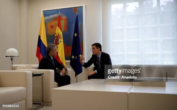 Spanish Prime Minister Pedro Sanchez and Colombian President Ivan Duque are seen during their meeting at Palace of Moncloa, official residence for...