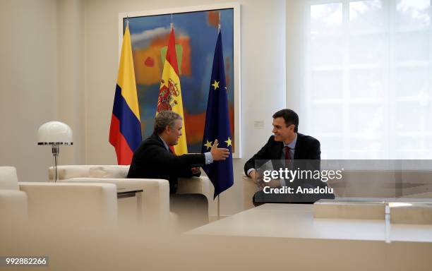 Spanish Prime Minister Pedro Sanchez and Colombian President Ivan Duque are seen during their meeting at Palace of Moncloa, official residence for...