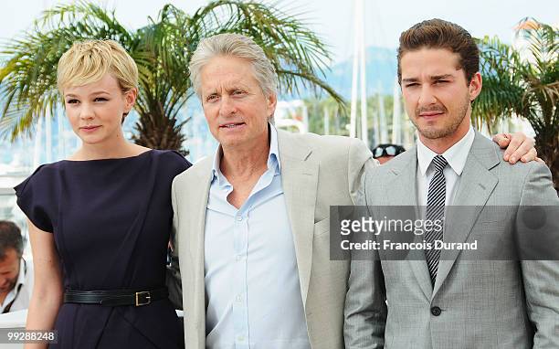 Actress Carey Mulligan, actor Michael Douglas and actor Shia Labeouf attend the 'Wall Street: Money Never Sleeps' Photocall at the Palais des...