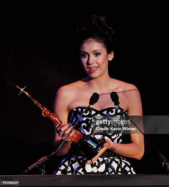 Actress Nina Dobrev appears an award onstage at the 12th Annual Young Hollywood Awards at the Wilshire Ebell Theatre on May 13, 2010 in Los Angeles,...