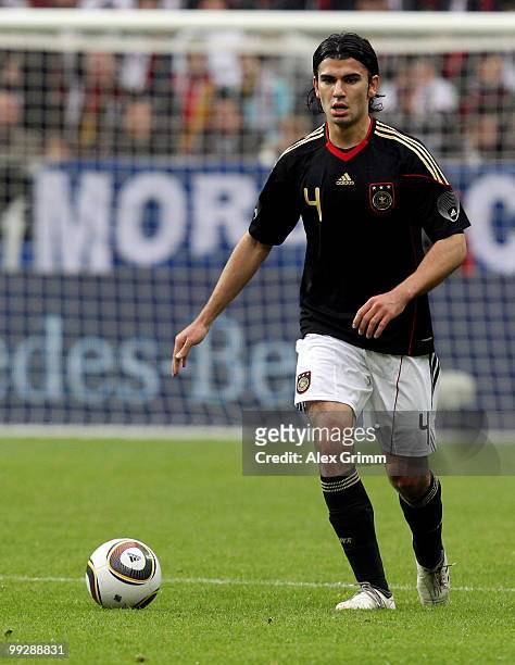 Serdar Tasci of Germany runs with the ball during the international friendly match between Germany and Malta at Tivoli stadium on May 13, 2010 in...