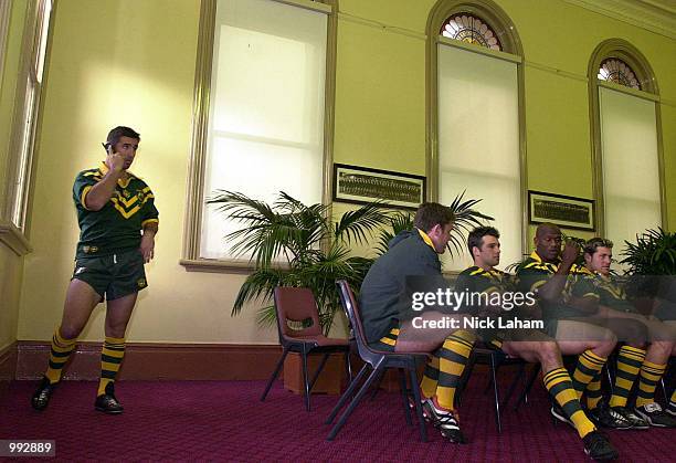 Andrew Johns makes a quick phone call during the Australian Rugby League team photo session at the SCG, Sydney, Australia. DIGITAL IMAGE Mandatory...