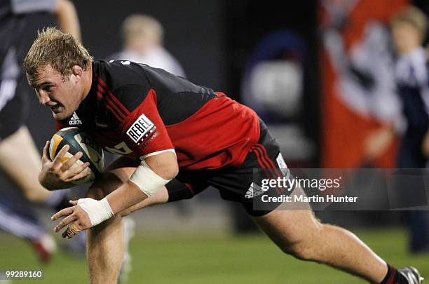 Owen Franks of the Crusaders dives over for a try during the round 14 Super 14 match between the Crusaders and the Brumbies at AMI Stadium on May 14,...