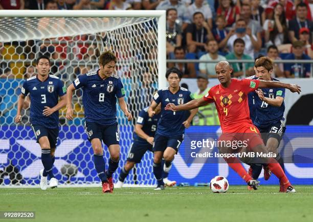 Genki Haraguchi, Vincent Kompany and Yuya Osako pictured in action during the 2018 FIFA World Cup Russia Round of 16 match between Belgium and Japan...
