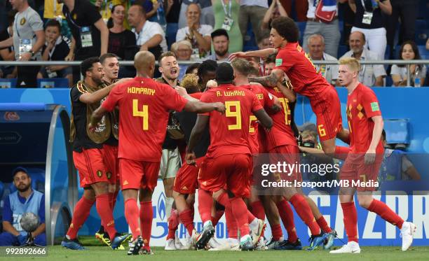 Belgian players celebrate after winning the 2018 FIFA World Cup Russia Round of 16 match between Belgium and Japan at Rostov Arena on July 2, 2018 in...