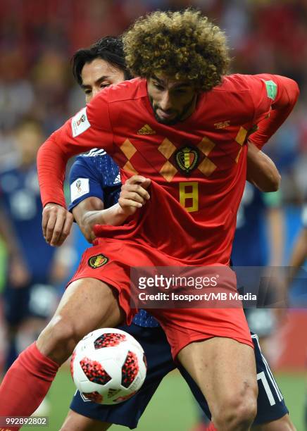 Makoto Hasabe and Marouane Fellaini pictured in action during the 2018 FIFA World Cup Russia Round of 16 match between Belgium and Japan at Rostov...