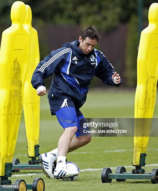 Chelsea's English footballer Frank Lampard participates in a team training session at the club's training facility in Cobham, southern England, on...