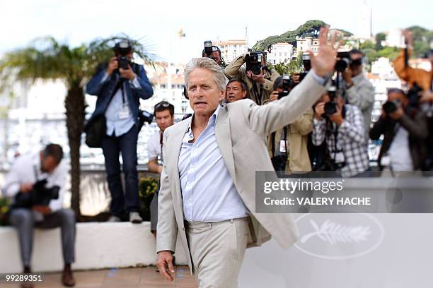 Actor Michael Douglas poses during the photocall of "Wall Street - Money Never Sleeps" presented out of competition at the 63rd Cannes Film Festival...