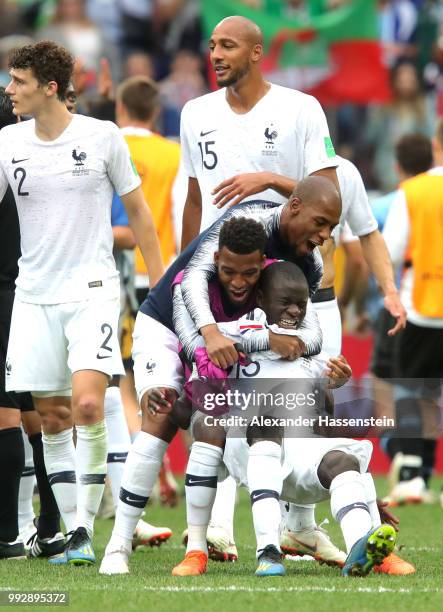 Ngolo Kante, Thomas Lemar and Djibril Sidibe of France celebrate victory following the 2018 FIFA World Cup Russia Quarter Final match between Uruguay...