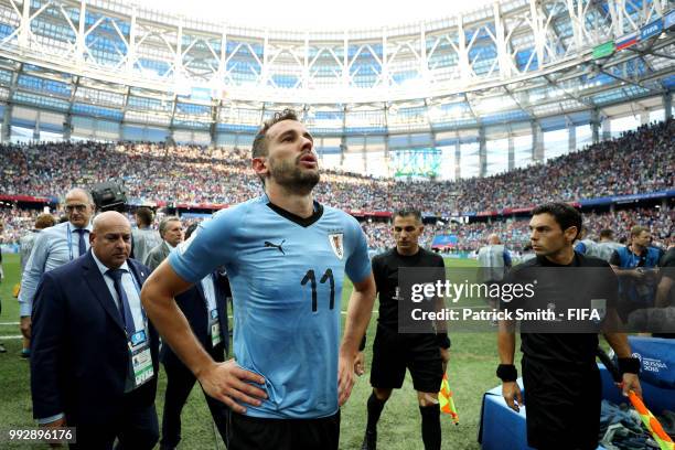 Cristhian Stuani of Uruguay looks dejected following his sides defeat in the 2018 FIFA World Cup Russia Quarter Final match between Uruguay and...